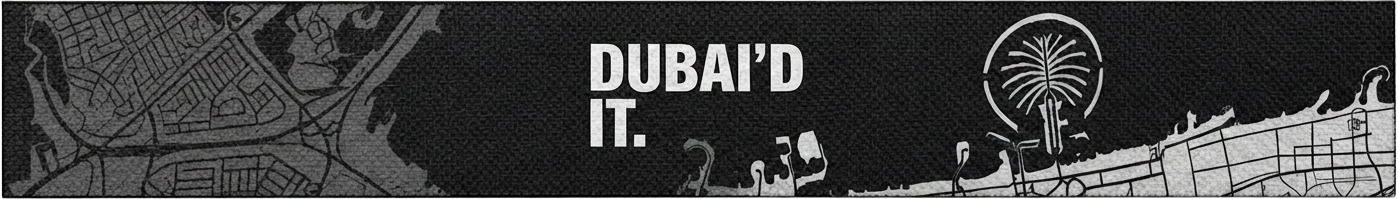 Black achievement side: DUBAI’D IT in bold type over the Palm and the coastline