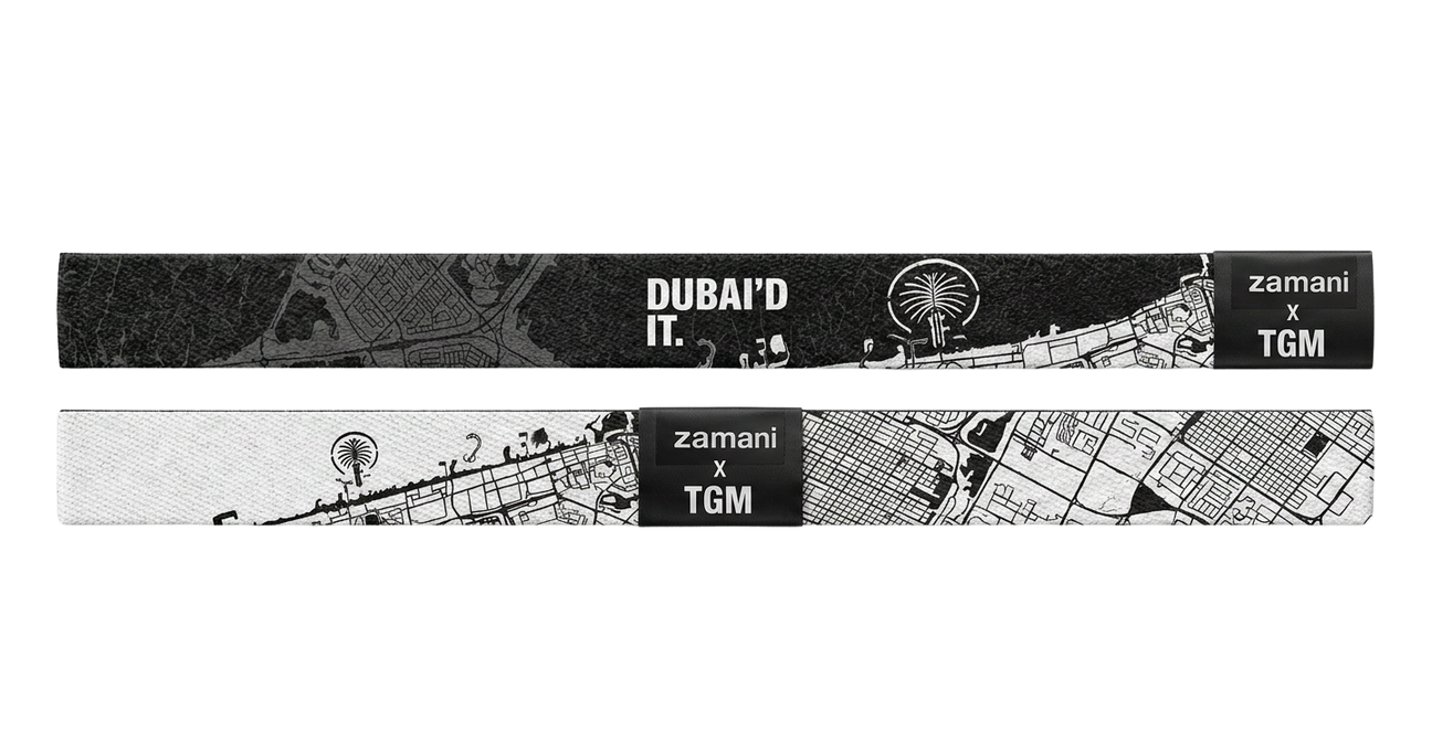 Both sides of the zamani x TGM band: black DUBAI’D IT side and white Dubai map side